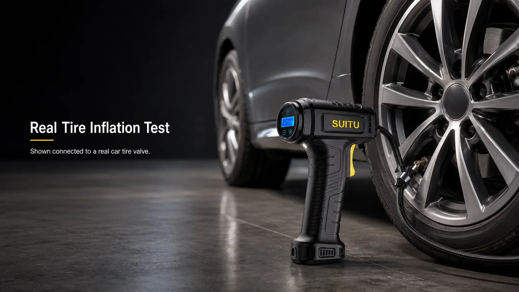 Cordless digital tire inflator connected to a real car tire valve, desktop layout