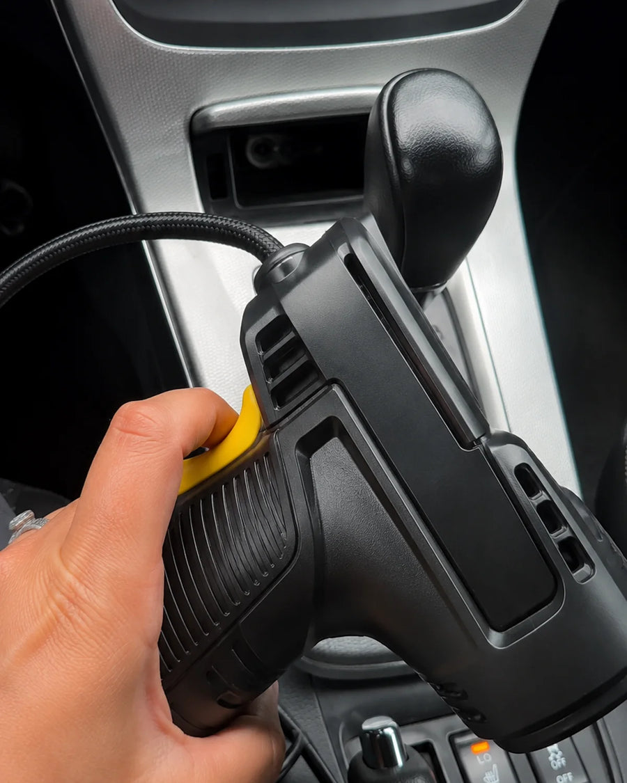 UGC photo - Cordless tire inflator inside a vehicle
